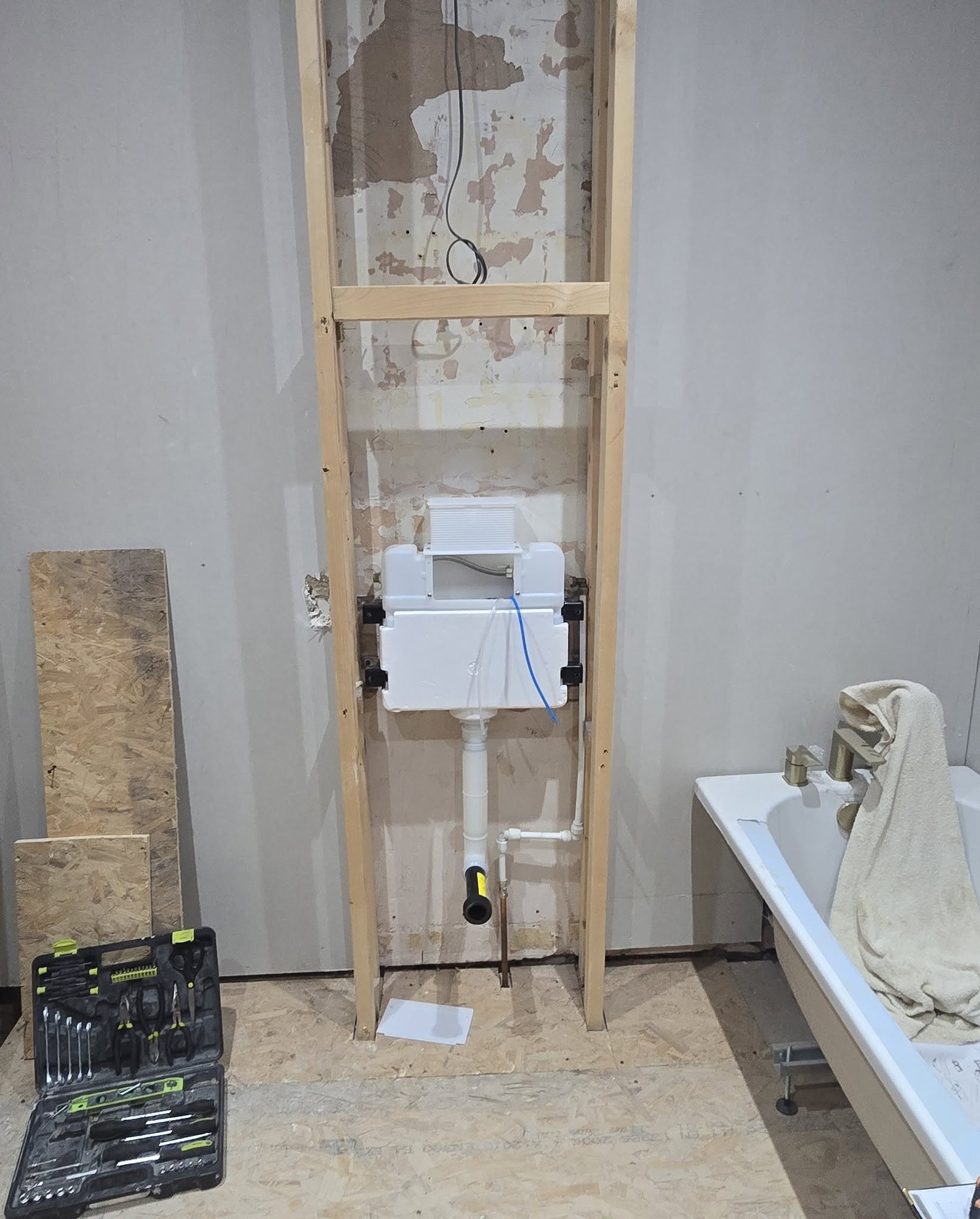 Concealed cistern frame going in behind the toilet wall